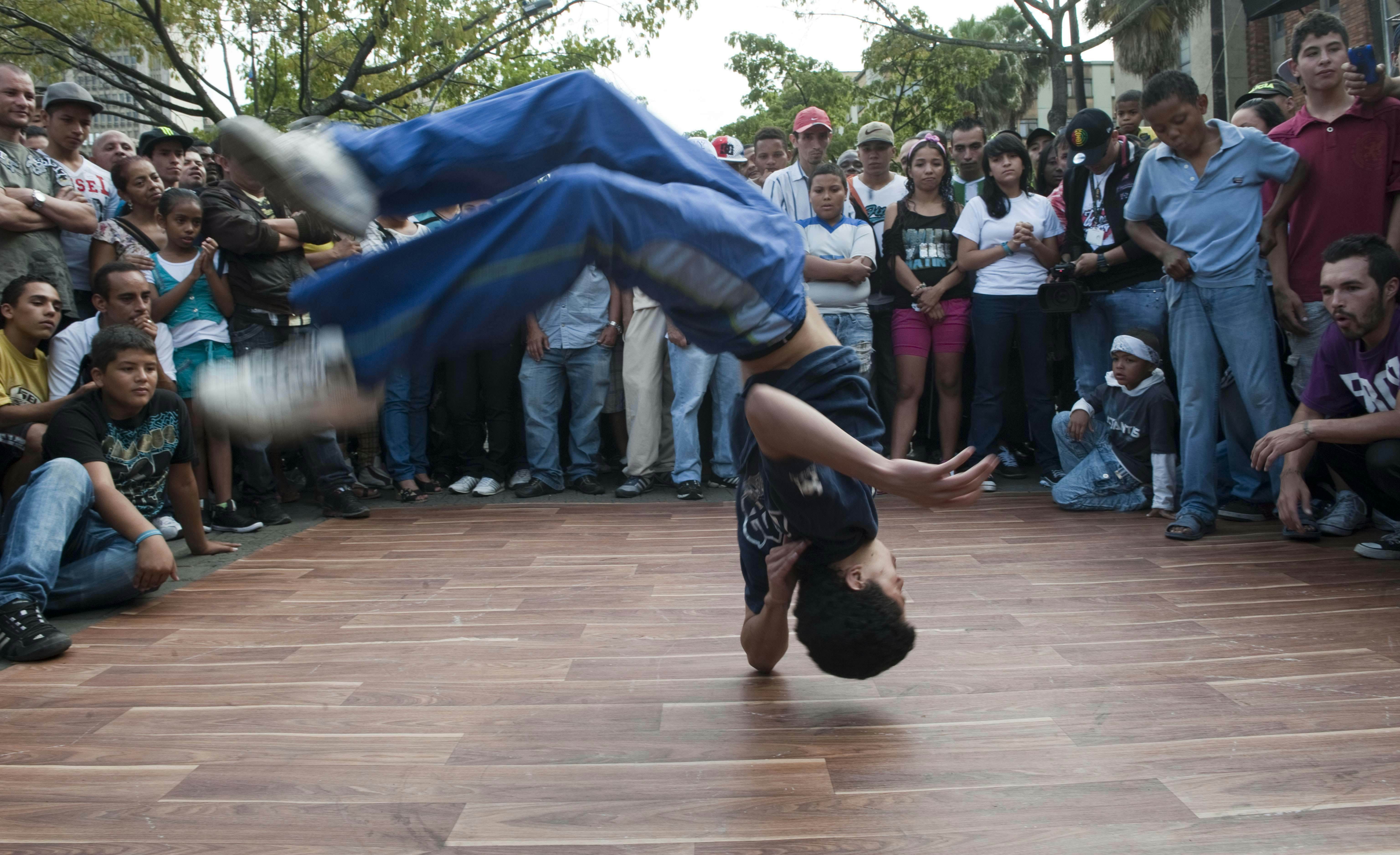 A man performs at Botero park during the Hip Hop Festival "Your voice counts", in Medellin, Antioquia department, Colombia on September 22, 2012. The festival, sponsored by the United Nations Office on Drugs and Crime, is the result of a competition of cultural and musical groups that use hip hop to spread positive messages.  AFP PHOTO/Raul ARBOLEDA        (Photo credit should read RAUL ARBOLEDA/AFP/GettyImages)